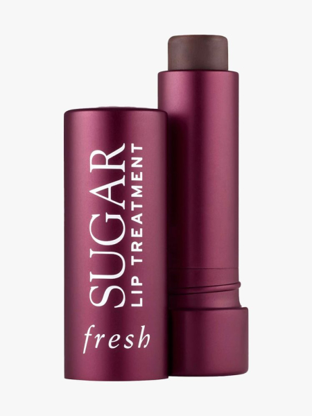 Fresh Sugar Lip Treatment berry twist-up lip balm with cap to the side on light gray background