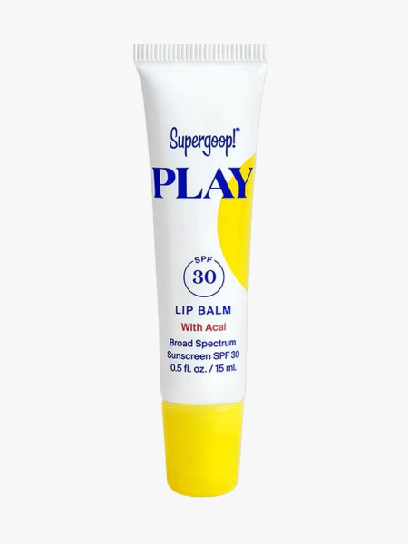 Supergoop! Play Lip Balm with SPF 30 in branded tube component on a light gray background